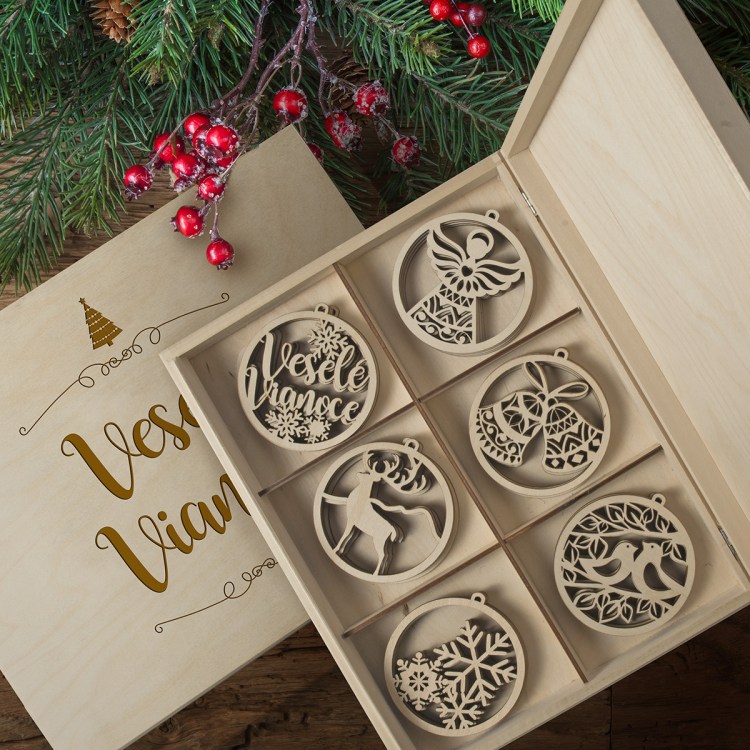 Laser cut and wooden Christmas ornament set with engraved wooden box.